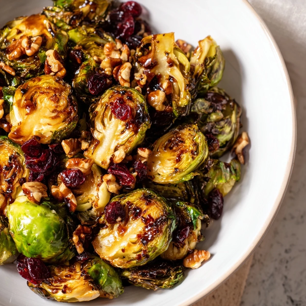 Golden-brown Winter Roasted Brussels Sprouts glistening with balsamic glaze, ready for serving.