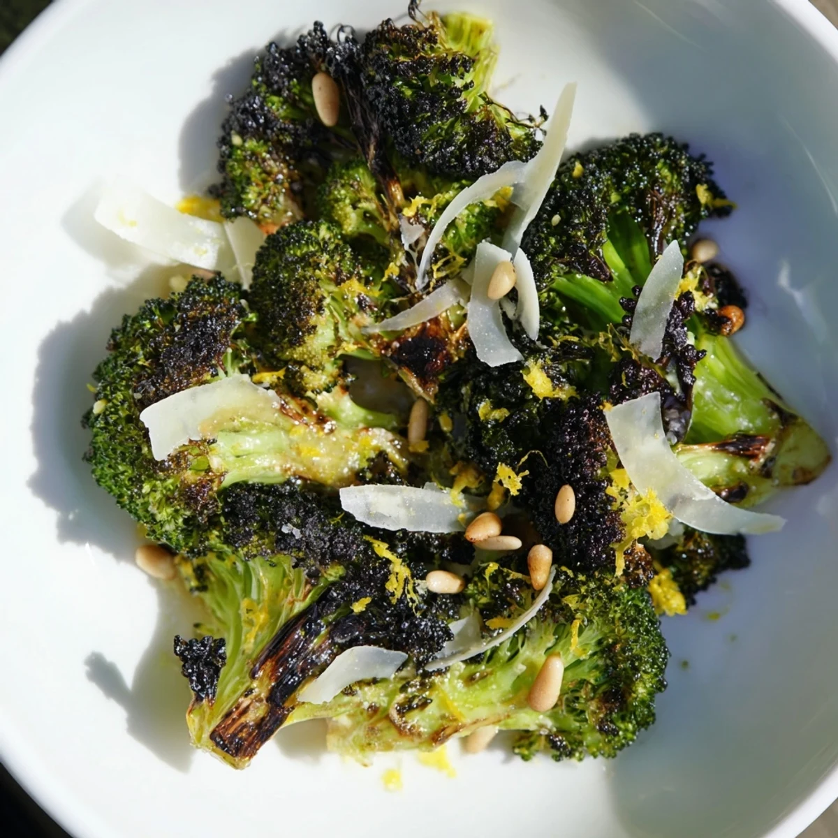 Golden-brown charred broccoli salad topped with shaved Parmesan offers a delicious, healthy side dish.