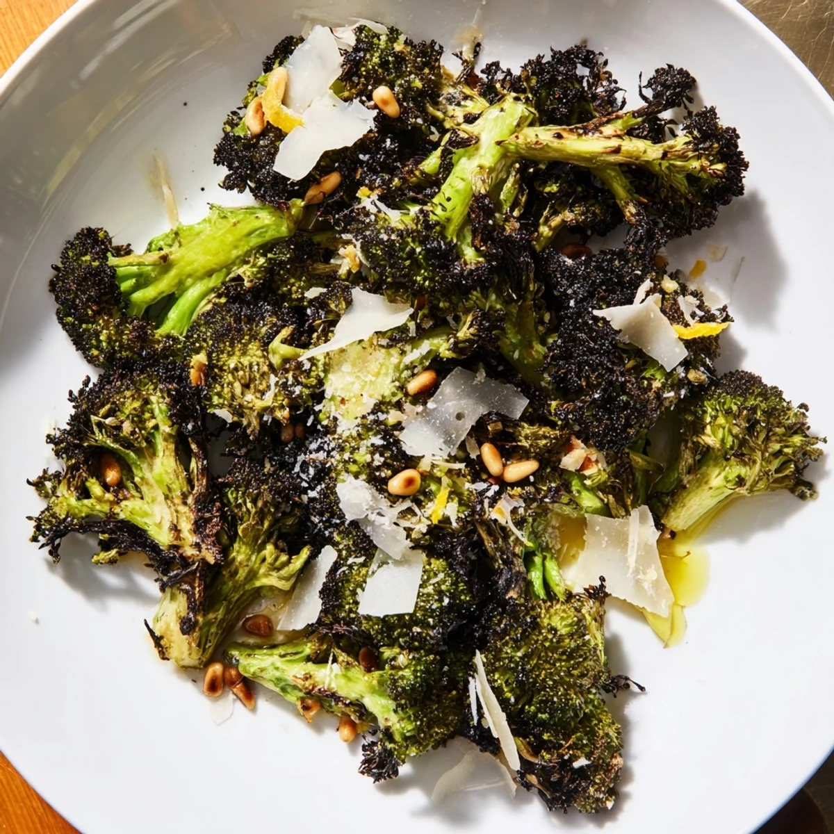 This bright photo shows off a flavorful charred broccoli salad ready to be enjoyed with friends.