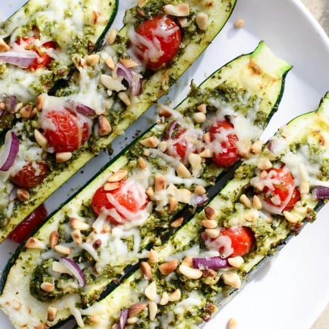 Cheesy Pesto Zucchini Boats