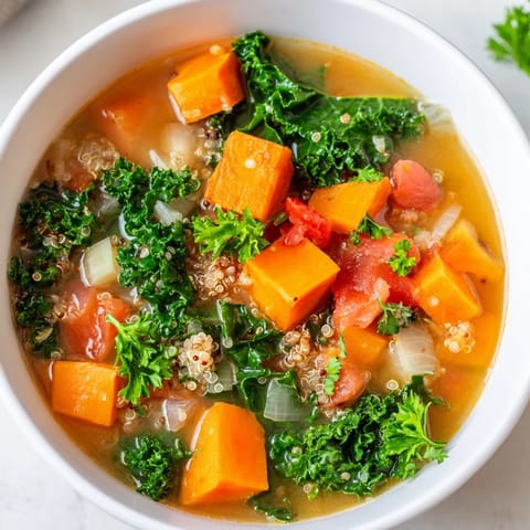 Hearty Nourishing Winter Veggie Soup, featuring tender vegetables and quinoa in a savory broth, so delicious.