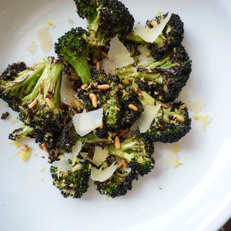 Freshly made charred broccoli salad with bright lemon dressing, perfect for a light vegetarian meal.